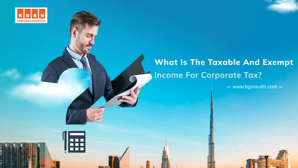 A man in a suit reviews a document in front of a cityscape with skyscrapers and a clear sky. The text reads: "What Is The Taxable And Exempt Income For Corporate Tax? - www.kgrnaudit.com". Icons of a calculator and documents are displayed, emphasizing the importance of understanding corporate income.